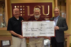 John O'Brien and Oscar O'Conner present check to Bob Healy as Premier Sponsor of Starburst