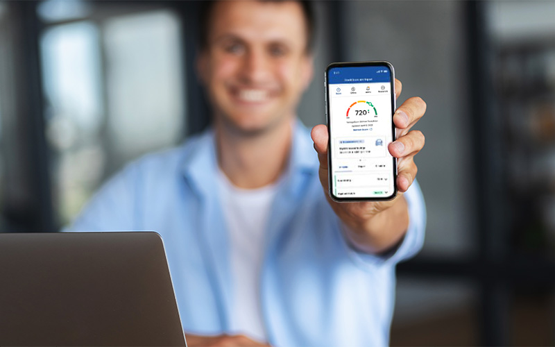 Person showing their credit score on phone.